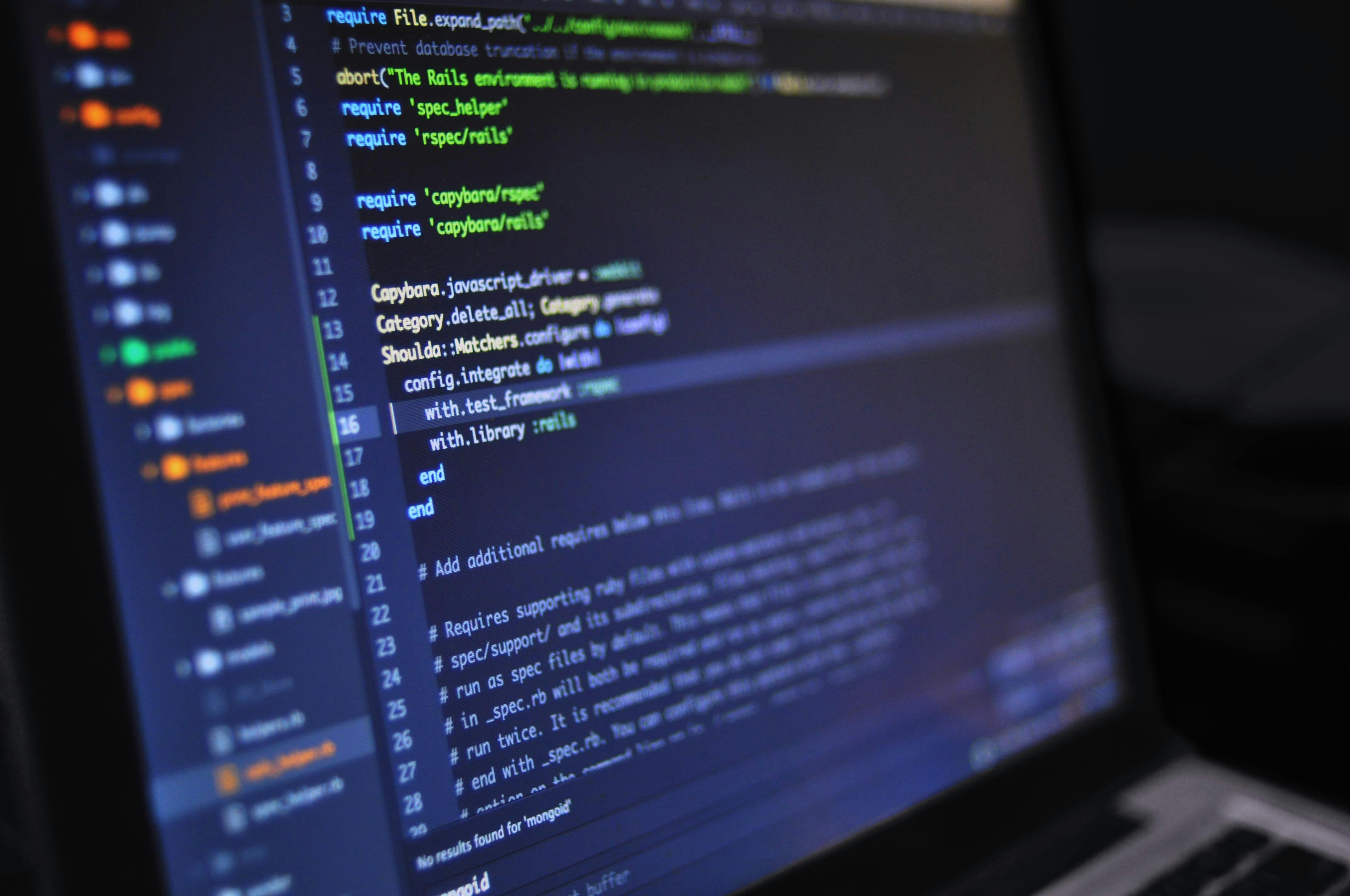 images revealing coding on the laptop